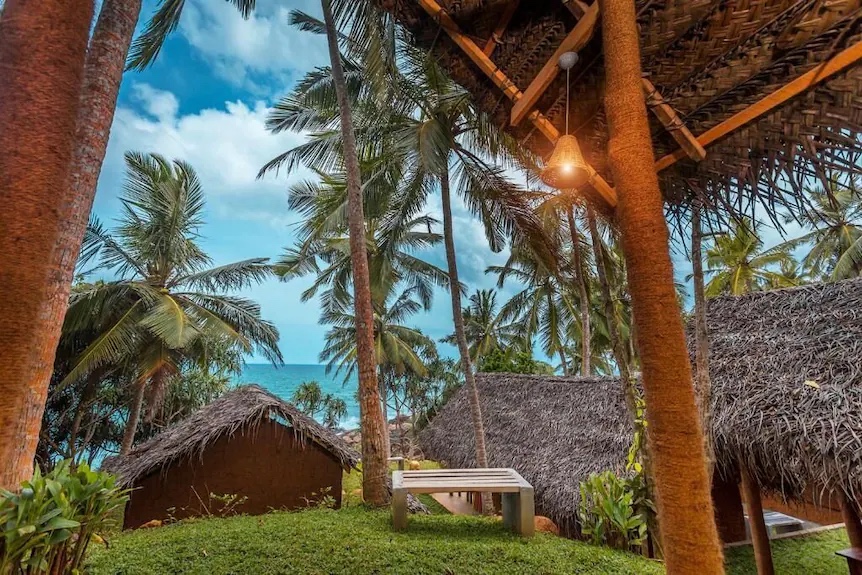A secluded coastal hideaway above a tropical Sri Lankan beach